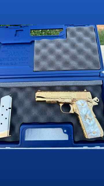 Hand Engraved Colt 1911 commander 